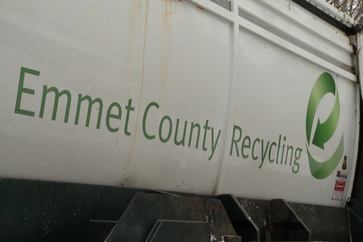 Emmet County Recycling logo posted on a piece of equipment